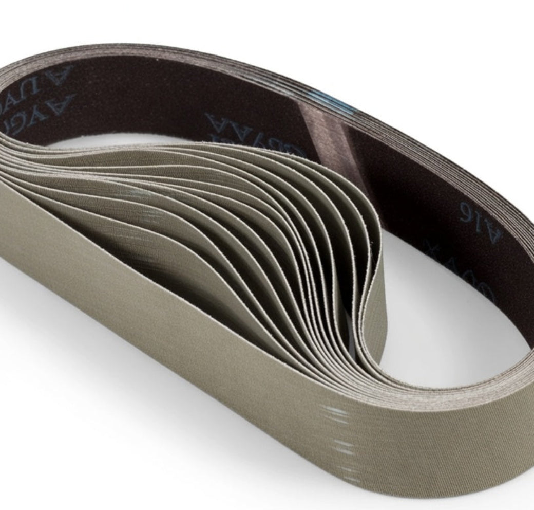 A coiled steel sanding belt with a brown abrasive side and a gray backing, shown on a clean white background.