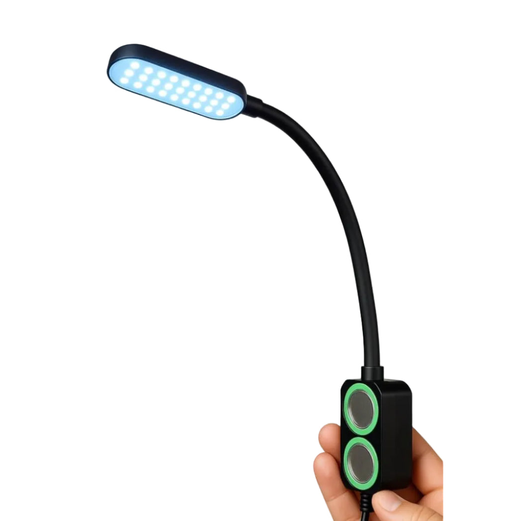 Hand holding a flexible LED light on a white background