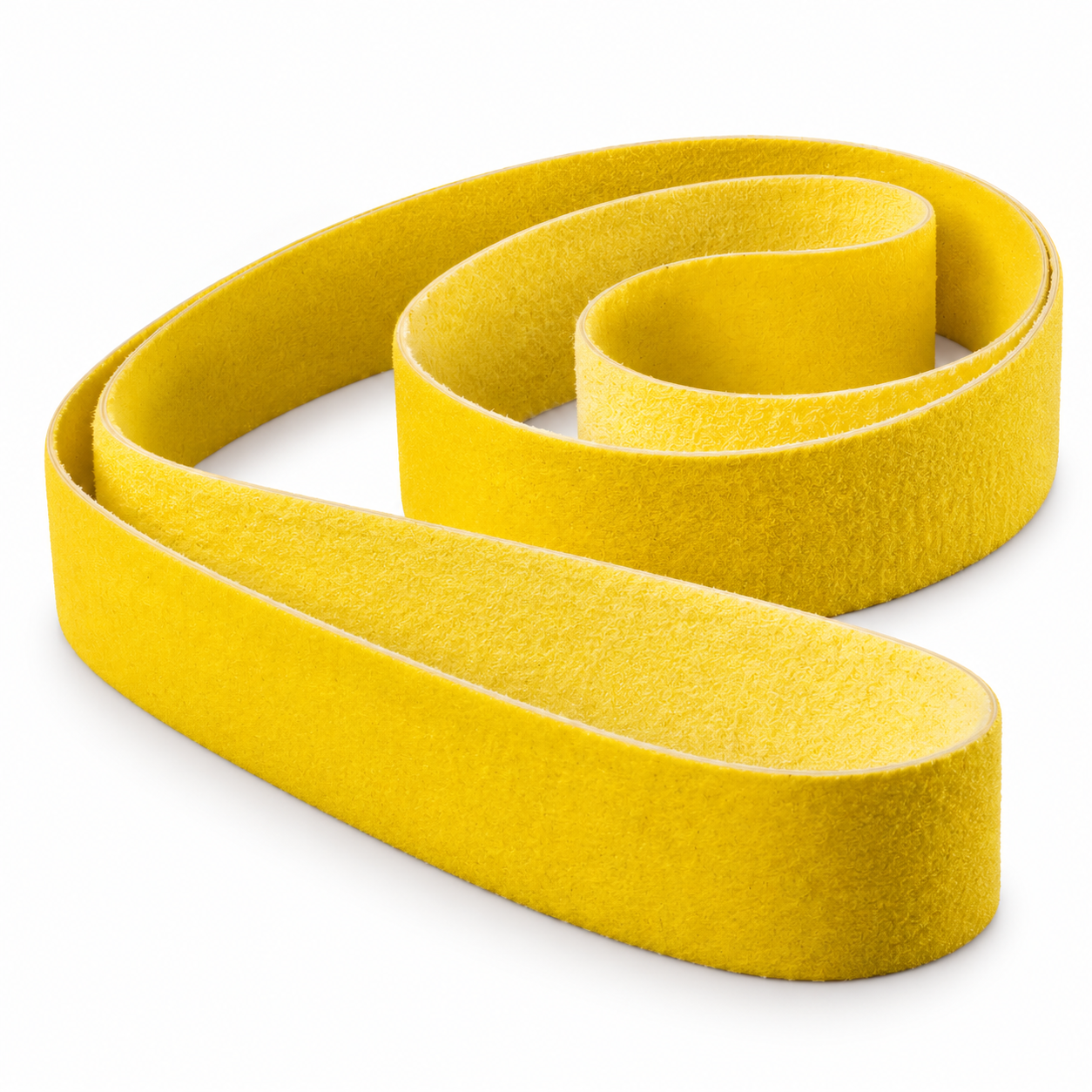 Yellow synthetic felt sharpening belt coiled on a white background